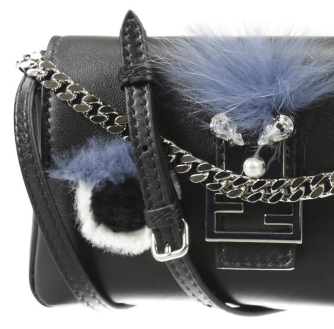 Next, a close-up captures the high-quality black leather and iconic monster detailing.