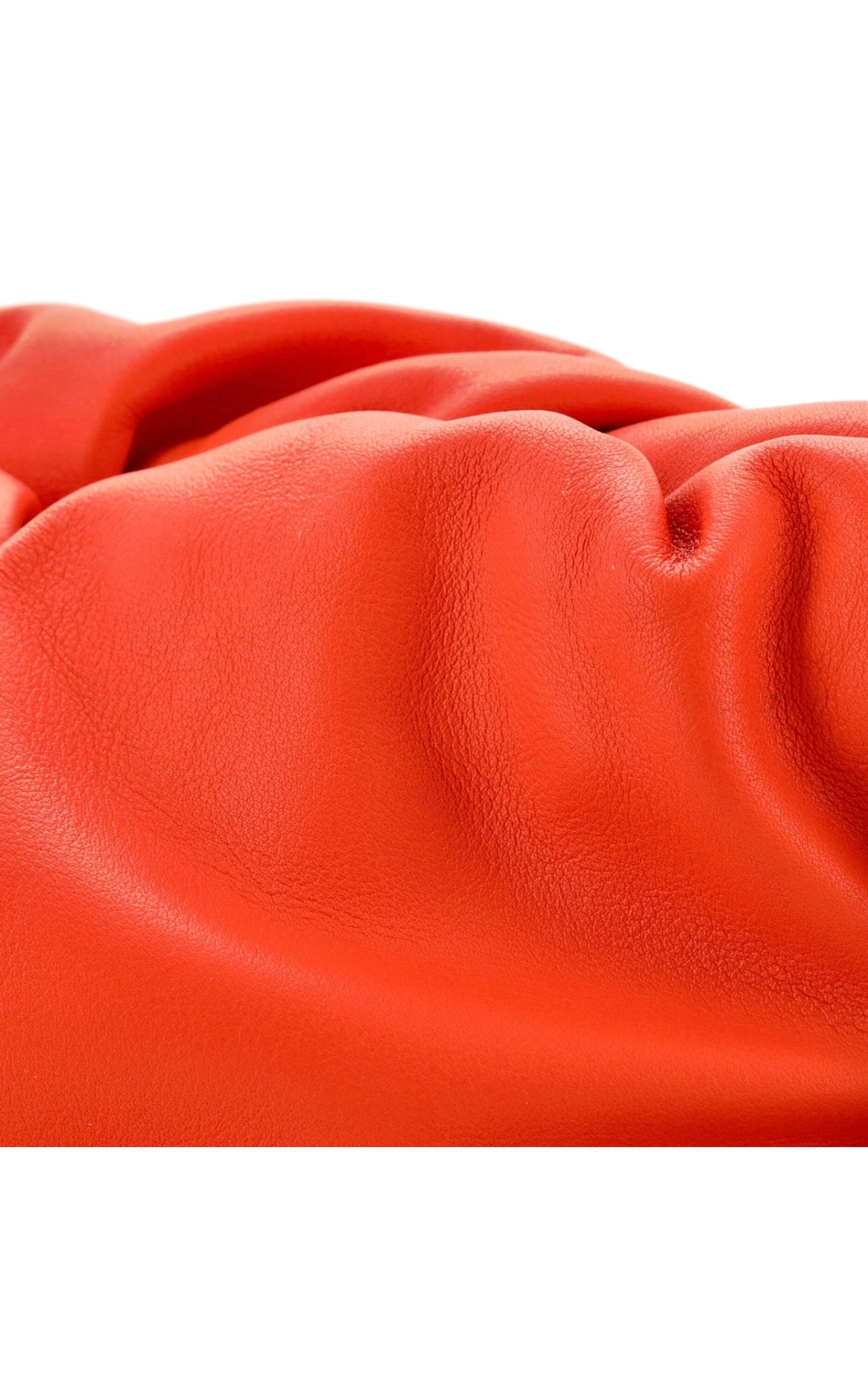 Bottega Veneta Orange Chain Pouch styled as a shoulder bag