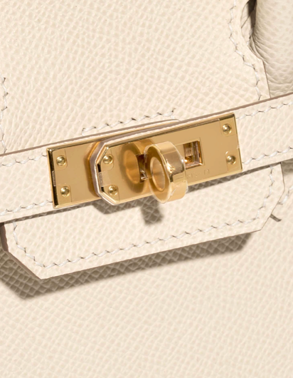 Side angle of Hermès Birkin 25 Craie in Epsom leather