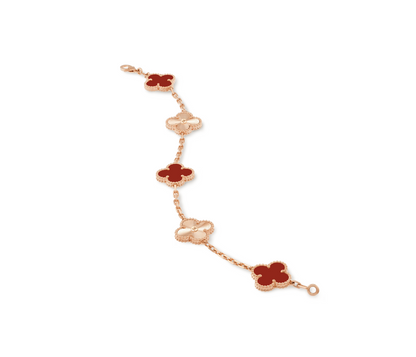 Next, a close-up captures the luxurious carnelian stones and the classic Alhambra design.