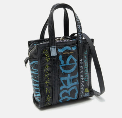 Close-up of graffiti design on Balenciaga Black Leather Bazar Mini Tote Bag