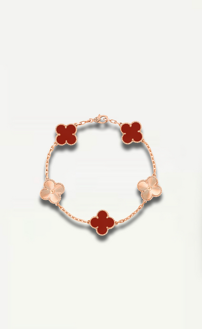 First, a front view of the Van Cleef & Arpels Alhambra Bracelet highlights its rose gold and carnelian motifs.