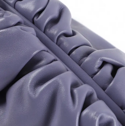Close-up of Bottega Veneta pouch zipper and stitching